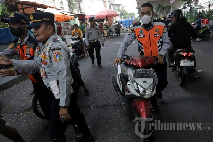 Pemprov DKI Jakarta Akui Kesalahan Balas Pengaduan Parkir Liar dengan Foto AI, Warga Geger