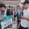 Wamensos Serahkan Bantuan ATENSI ke Warga Pringsewu